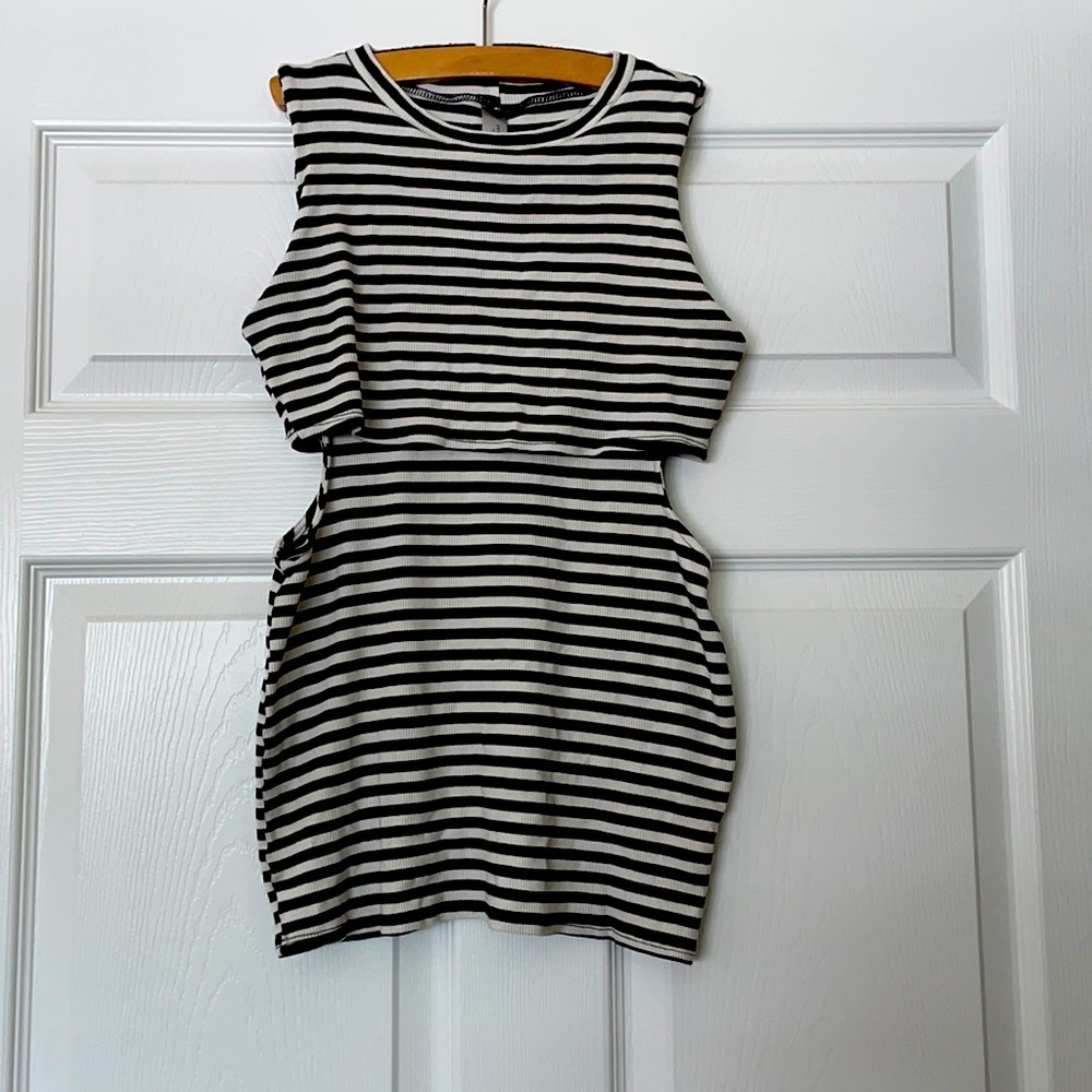 Stretchy, but tight fitting. Mini dress.